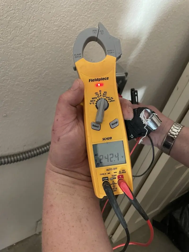 Voltage testing with clamp meter during Hot Tub / Pool Electrical Wiring in Bethel Acres